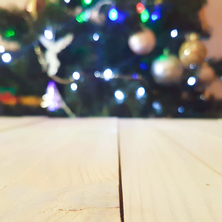 christmas wood table background with christmas tree. New Year concept