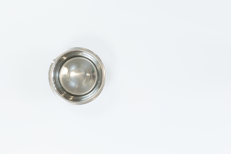 Dry dog food in metal bowl, top view and flat layの写真素材