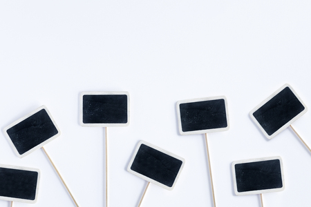 Group of vintage chalkboards or signbaords with copy space in wooden frame isolated on white background, flat layの写真素材