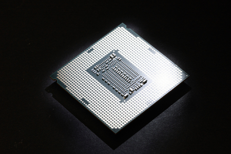 Computer processor on black background close-up, technology conceptの写真素材