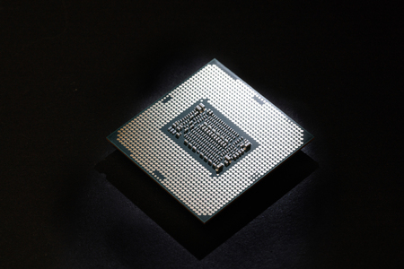 Computer processor on black background close-up, technology conceptの写真素材