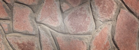 Coral old stone wall panoramic background. Backdrop for office designの写真素材