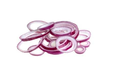 Close-up of sliced red onion rings isolated on white background. Macro shot, high qualityの写真素材