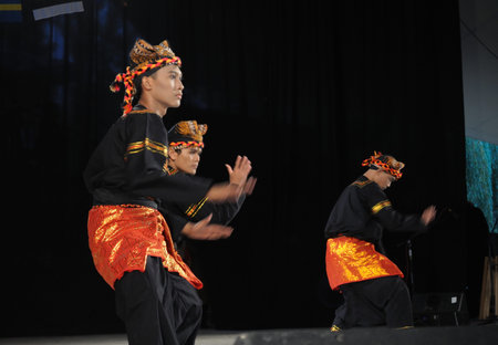 Warsaw, Poland - August 19, 2010 - Traditional dance team TETA from Indonesia - performs folk dances during the International Folklore Festival WARSFOLKのeditorial素材