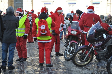 Warsaw, Poland - December 5, 2010 - MOTOMIKOLAJKI 2010 - annual gathering of Santas on bikes, as part of helping children in orphanages.のeditorial素材