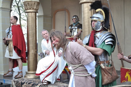 Gora Kalwaria, Poland - April 17, 2011 - Actors reenact the trial of Jesus in praetorium before Pontius Pilate, during the street performances Mystery of the Passion.のeditorial素材