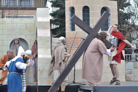 Gora Kalwaria, Poland - April 17, 2011 - Jesus carrying his cross, on the way to his crucifixion,...