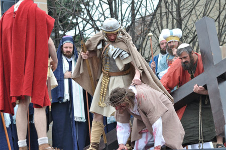 Gora Kalwaria, Poland - April 17, 2011 - Jesus falls on the way to his crucifixion, during the...
