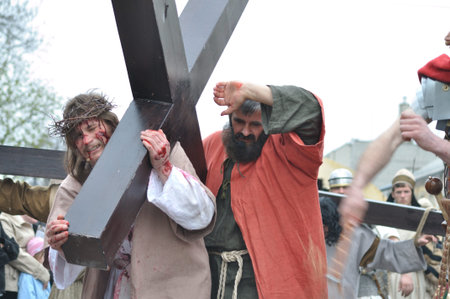 Gora Kalwaria, Poland - April 17, 2011 - Jesus carrying his cross, on the way to his crucifixion,...