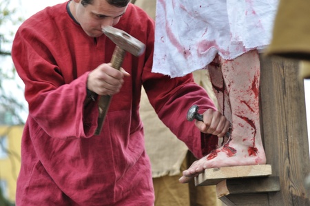Gora Kalwaria, Poland - April 17, 2011 - Actors reenacting the crucifixion of Jesus Christ, during the street performances Mystery of the Passion.のeditorial素材