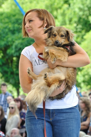 Warsaw, Poland - June 26, 2011 - Katarzyna Klich (pop singer) promotes social shares for adoption of animals - Love a doggie - during the Warsaw Fashion Street.のeditorial素材