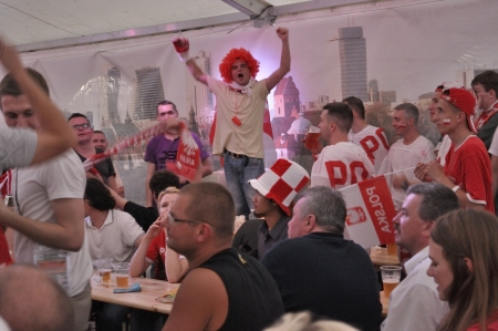 Warsaw, Poland - June 8, 2012 - Group of Poland fans watching football match on Television in pub, during the UEFA EURO 2012 Group A match against Greece.のeditorial素材