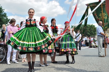 Lowicz, Poland - June 23, 2011 - Participants in the Corpus Christi procession, dressed in regional costumes.のeditorial素材