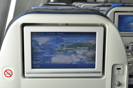 WARSAW - AUGUST 4  LCD monitor on Passenger Seat in the cabin Boeing 787 Dreamliner of the LOT...