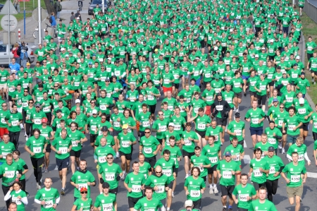WARSAW, POLAND - OCTOBER 3  More than 9000 runners compete in the Run Warsaw a 10km race on through the main streets of city, October 3, 2010 in Warsaw, Polandのeditorial素材