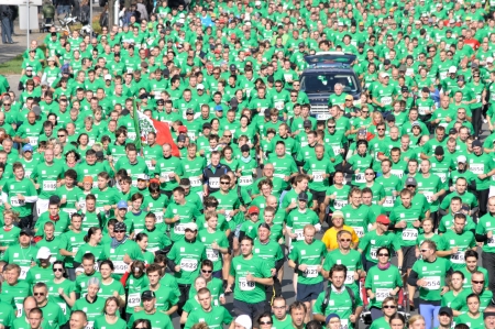 WARSAW, POLAND - OCTOBER 3  More than 9000 runners compete in the Run Warsaw a 10km race on through the main streets of city, October 3, 2010 in Warsaw, Poland のeditorial素材