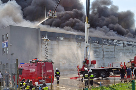 Wolka Kosowska Poland May 10 2011 Firefighters extinguish a raging fire in a storehouse Mart China.