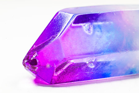 amethyst gemstone isolated on white background macro close up view.の写真素材