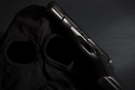 Pistol and mask of a thief 3の写真素材