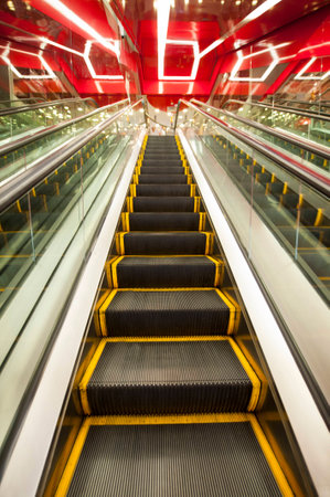 An empty escalator await for customers.の写真素材