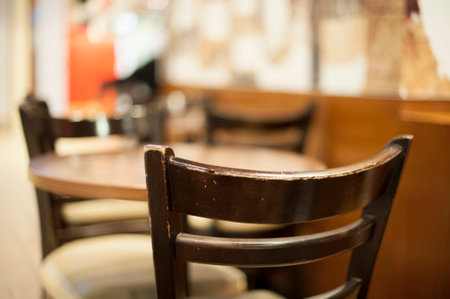 An old chair awaits for its first customer of the day.の写真素材