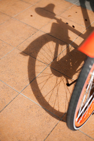 A shadow is cast on a sunny day.の写真素材