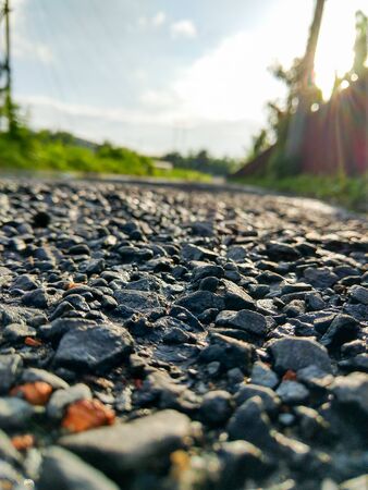 Spring portrait with rocks greenery and blue skyの写真素材
