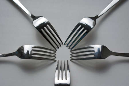 five forks on a white backgroundの写真素材