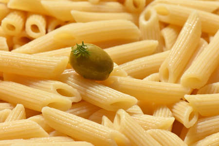 italian pasta with olive on topの写真素材