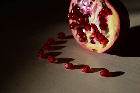 Half pomegranate with seedsの写真素材