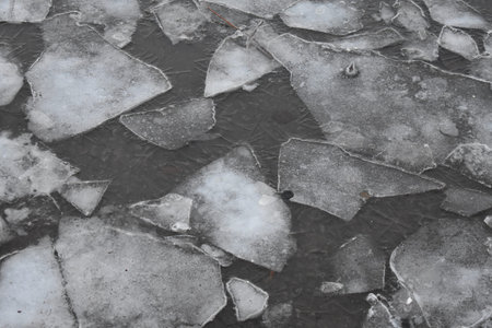 stone in the ice on the beach