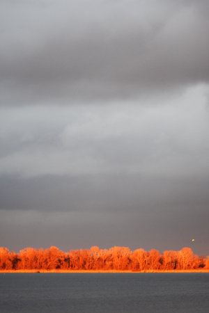 sunset over the lake in autumn, photo as a background, digital imageの写真素材