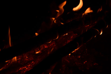 Fire flames on a black background. Abstract fire flames on a black background.の写真素材