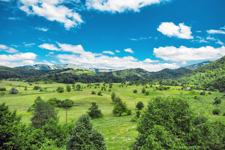 Field, road and skyの写真素材