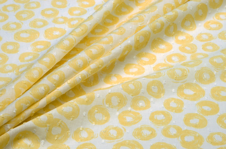Cloth cotton, yellow camomile in polka dotsの写真素材
