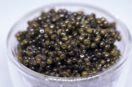 Black caviar isolated on white background