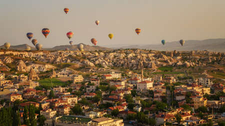 CAPPADOCIA, TURKEY - MAY 04, 2018: Hot air balloon flying over rock landscape at Cappadocia Turkeyのeditorial素材