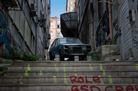 May 1, 2018, Istanbul, Turkey: an old abandoned broken and rusty blue car without headlights and a crack on the windshieldのeditorial素材