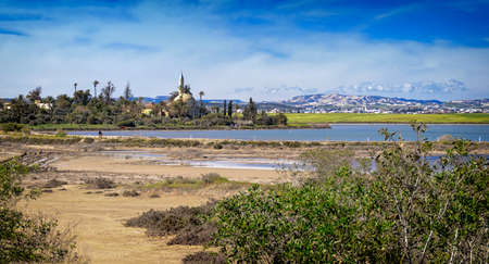 Hala Sultan Tekke or Mosque of Umm Haram is a Muslim shrine on the west bank of Larnaca Salt Lake in Cyprus.の写真素材