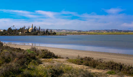 Hala Sultan Tekke or Mosque of Umm Haram is a Muslim shrine on the west bank of Larnaca Salt Lake on Cyprus.のeditorial素材