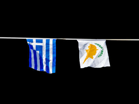 Greek an Cyprus flag isolated on blackの写真素材