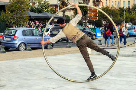 THESSALONIKI, GREECE - March 26. Street artist gives an acrobatic show on March 26, 2017 in Thessaloniki.のeditorial素材