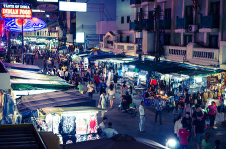 BANGKOK - OCTOBER 13: Tourists and backpackers walk by Khao San Road on October 13, 2014 in Bangkok, Thailand. Khao San Road is a famous low budget hotels and guesthouses area in Bangkok.のeditorial素材