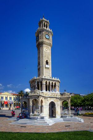 IZMIR, TURKEY - June 14, 2017: Famous ancient clocktower in Konak Square, Izmir, built in 1901, the...