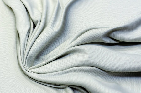 Texture, background, pattern. Gray cotton textured fabric for tailoring.