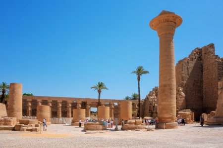 Ancient ruins of the Karnak Temple in Luxor (Thebes), Egypt. The largest temple complex of antiquity in the world. UNESCO World Heritage. View from sphinxes alley.のeditorial素材