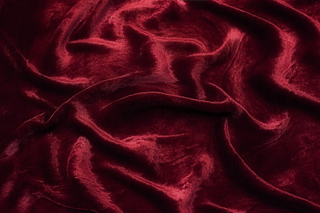 Close-up texture of natural red or pink fabric or cloth in same color. Fabric texture of natural...