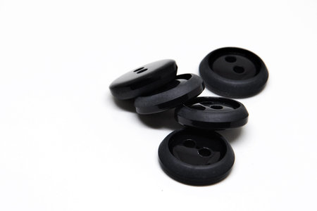 Colorful buttons for clothes on white background using for concept of Button Day.