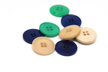 Buttons for clothes on white background using for concept of Button Day.