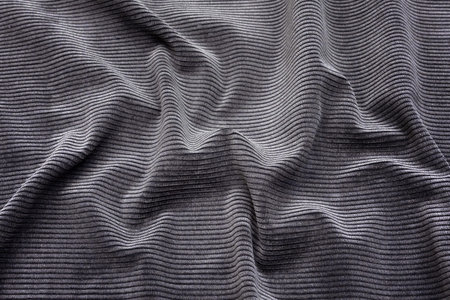 Abstract background texture of natural black color fabric. Fabric texture of natural cotton or...